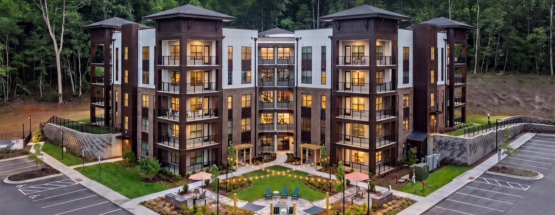 an apartment building with a parking lot