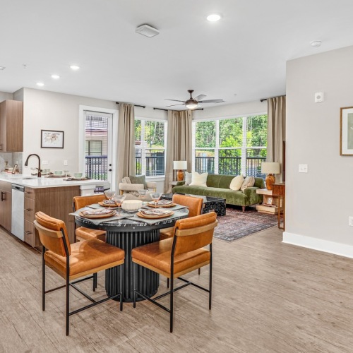 a dining room with a table and chairs