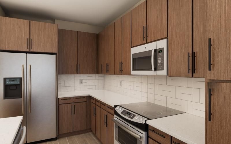 a kitchen with wooden cabinets