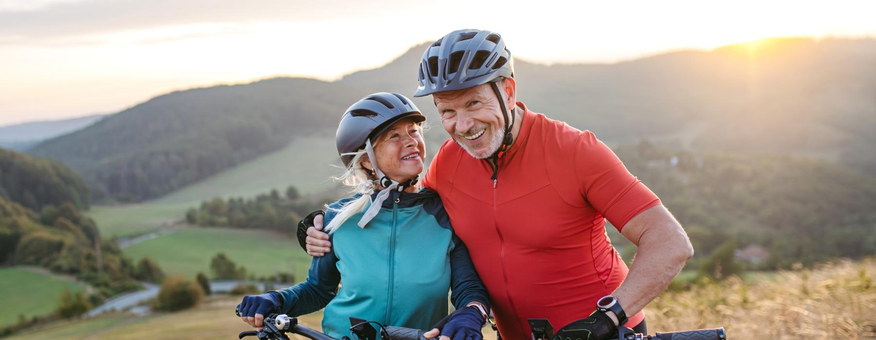a man and woman on bicycles