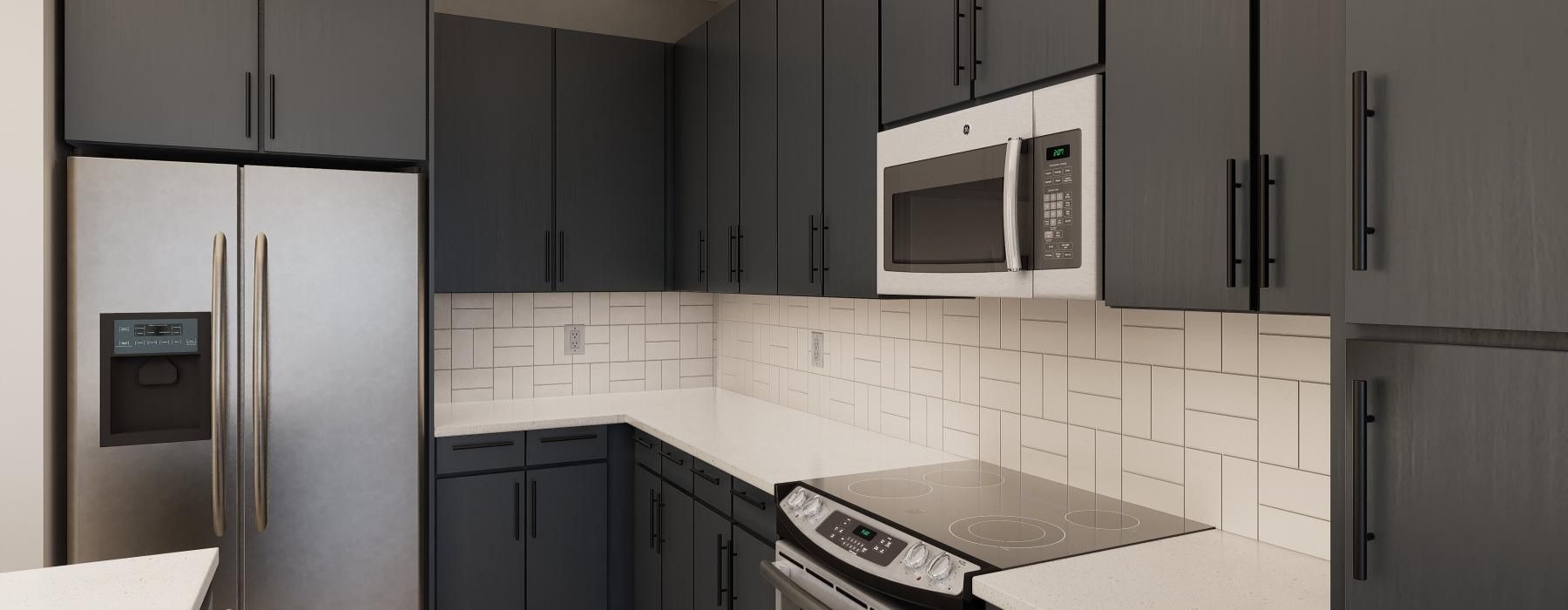 a kitchen with black cabinets